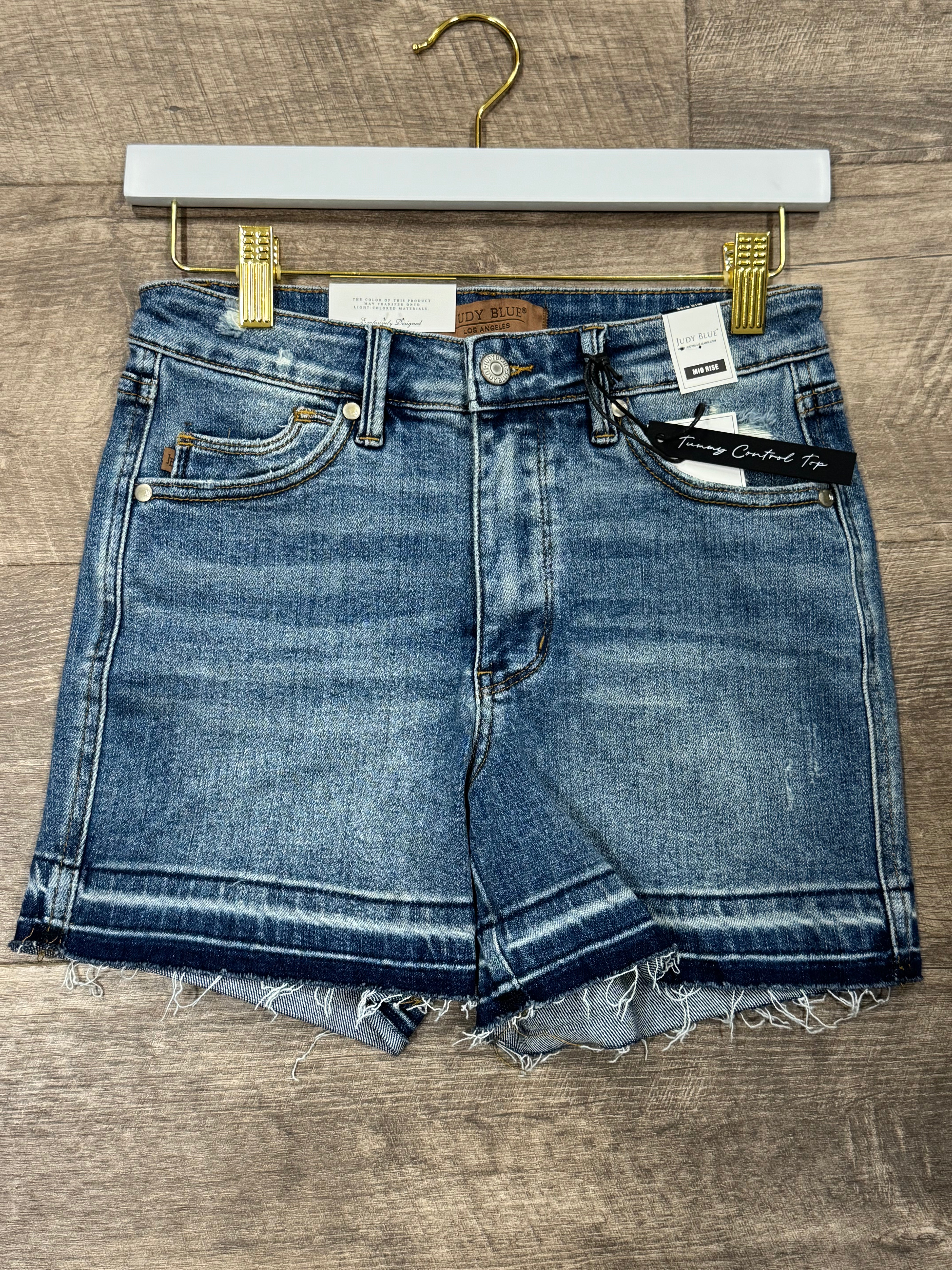 Judy Blue Mid Rise Tummy Control Vintage Wash Release Hem Shorts - Posh West Boutique