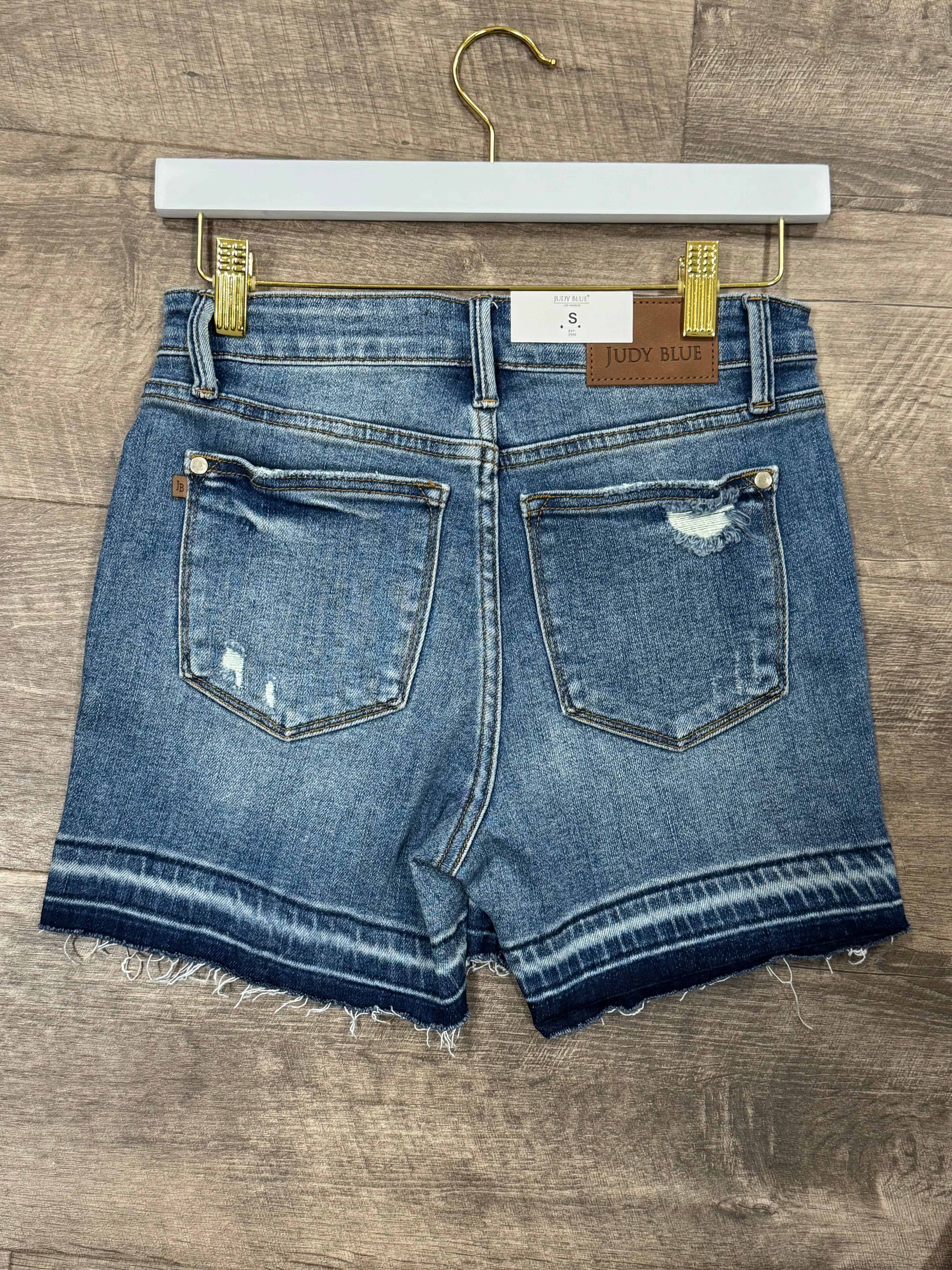 Judy Blue Mid Rise Tummy Control Vintage Wash Release Hem Shorts - Posh West Boutique