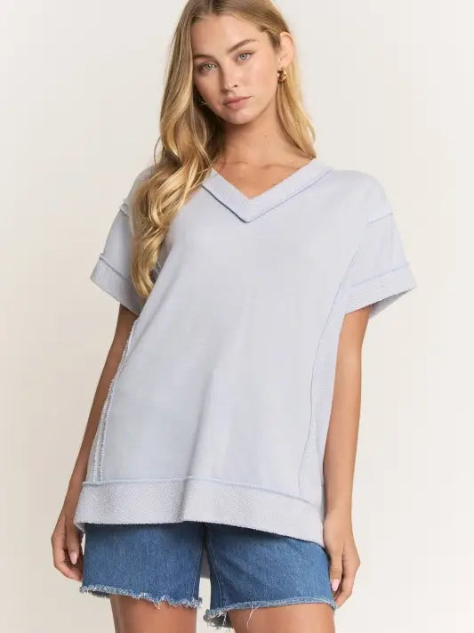 Lt Blue Raw Edge V Neck Top - Posh West Boutique