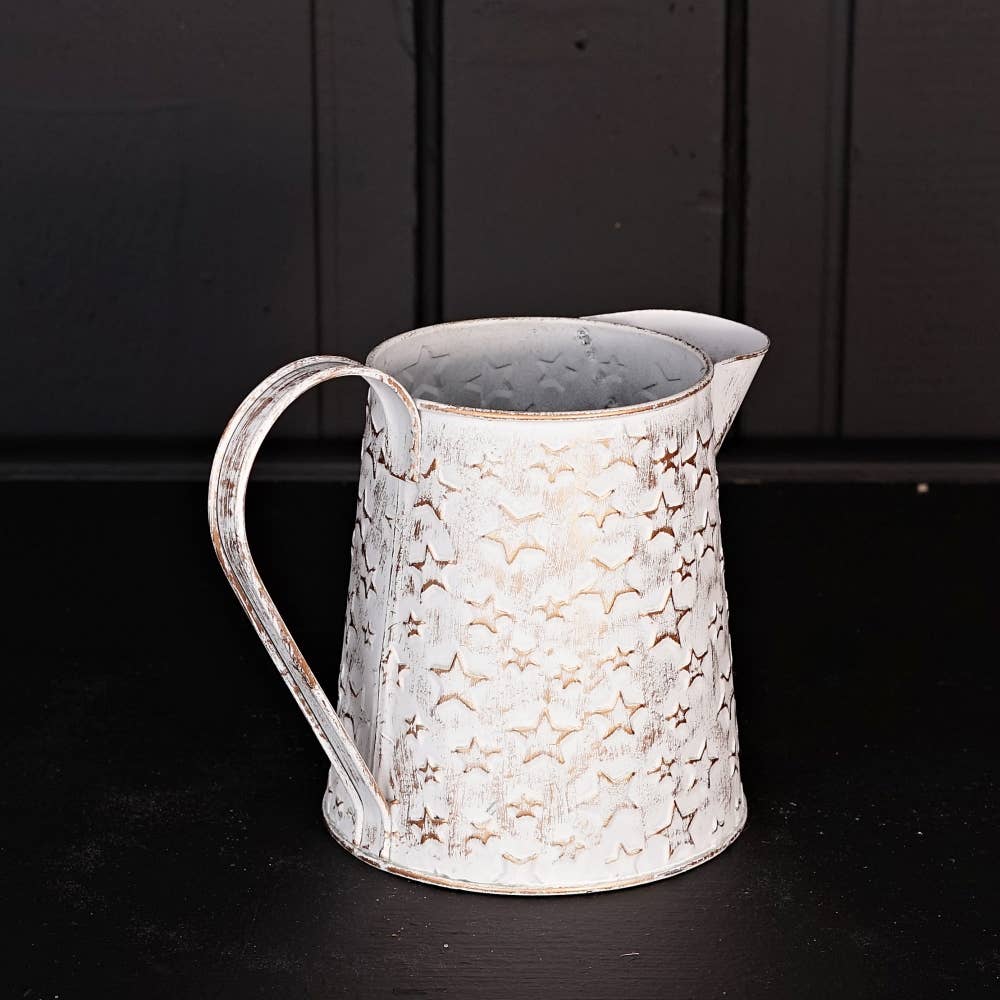 Vintage white metal pitcher w/ star