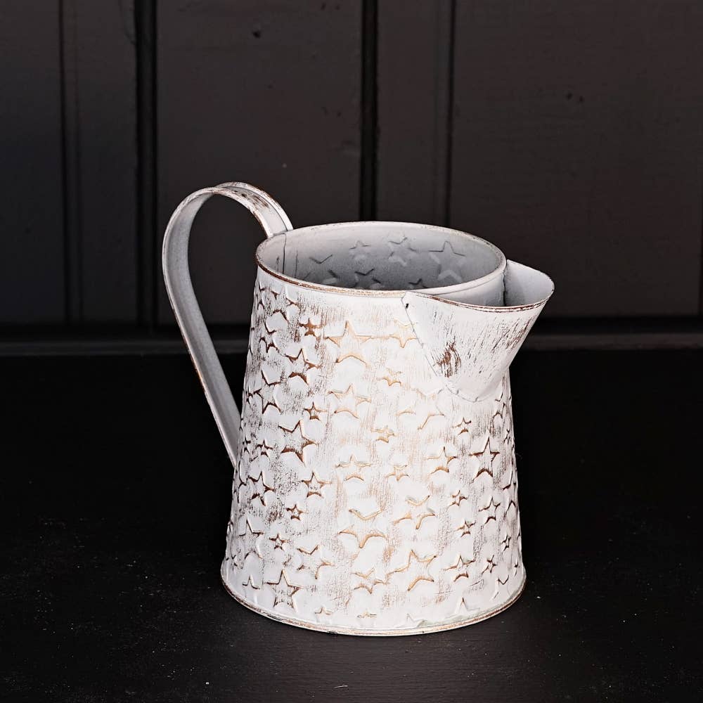 Vintage white metal pitcher w/ star