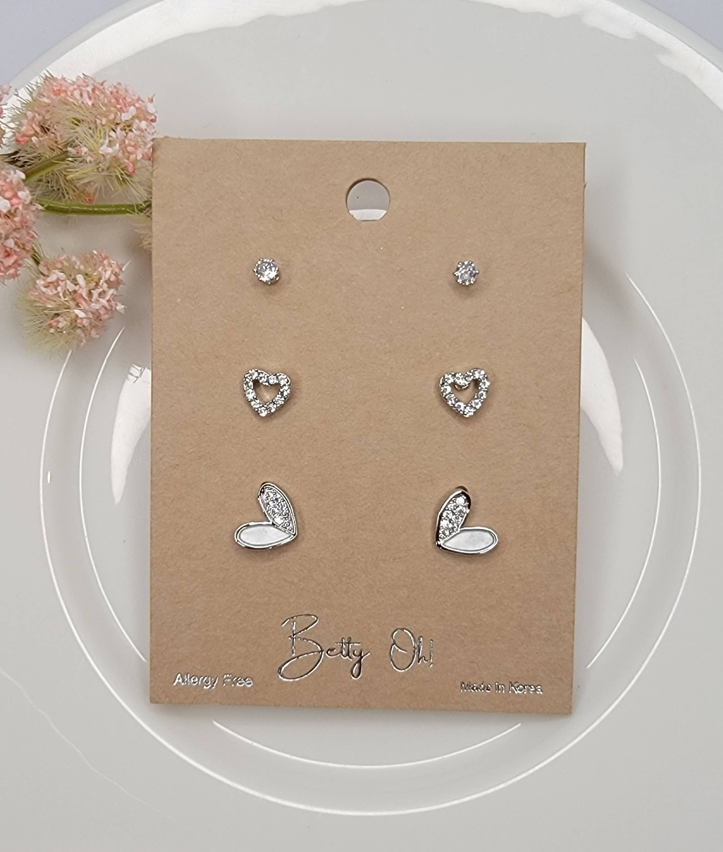 HEART DESIGN THREE PAIR SET POST EARRINGS.